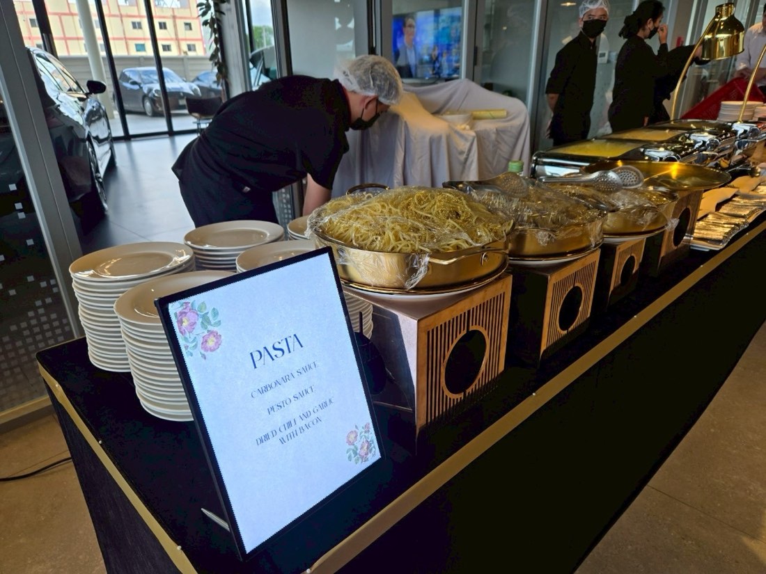 Buffet catering station set up by Mekin at a corporate event